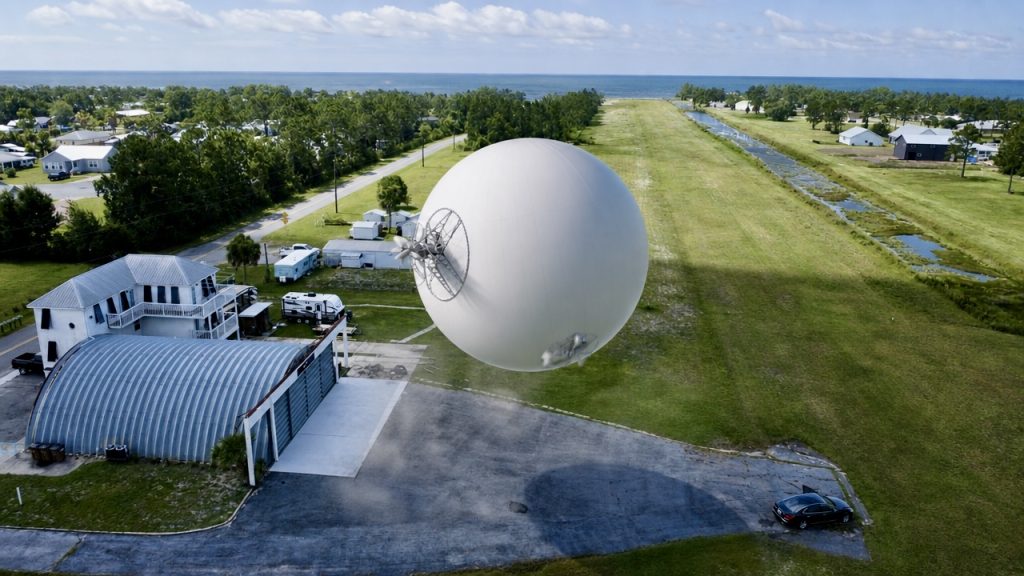 Drone Airship flying over Company Airport with Gulf of America in the background